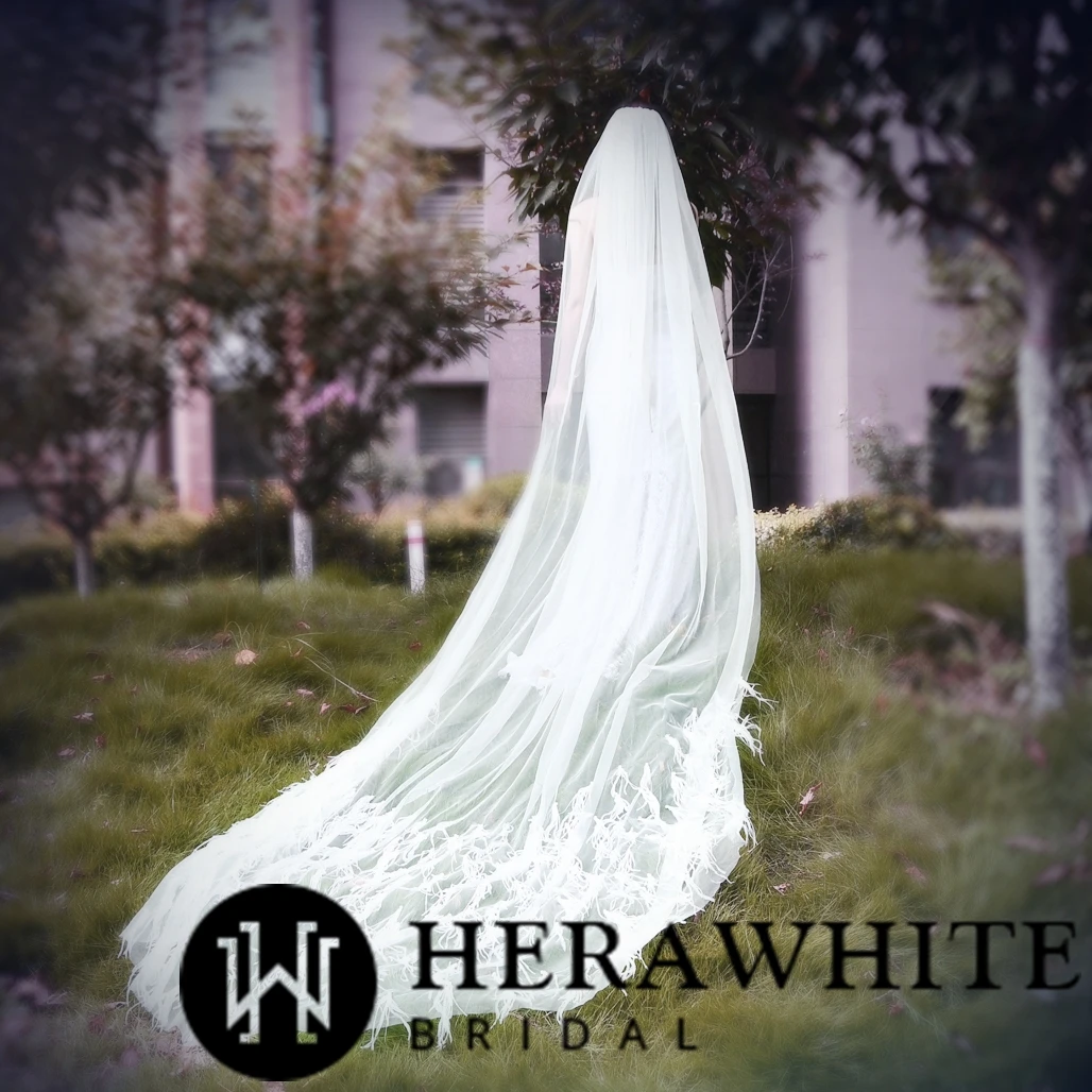 Voile de Mariée Long à Plumes Voile De Mariée Long à Plumes -Soiree Blanche Boutique 1fc5e43694