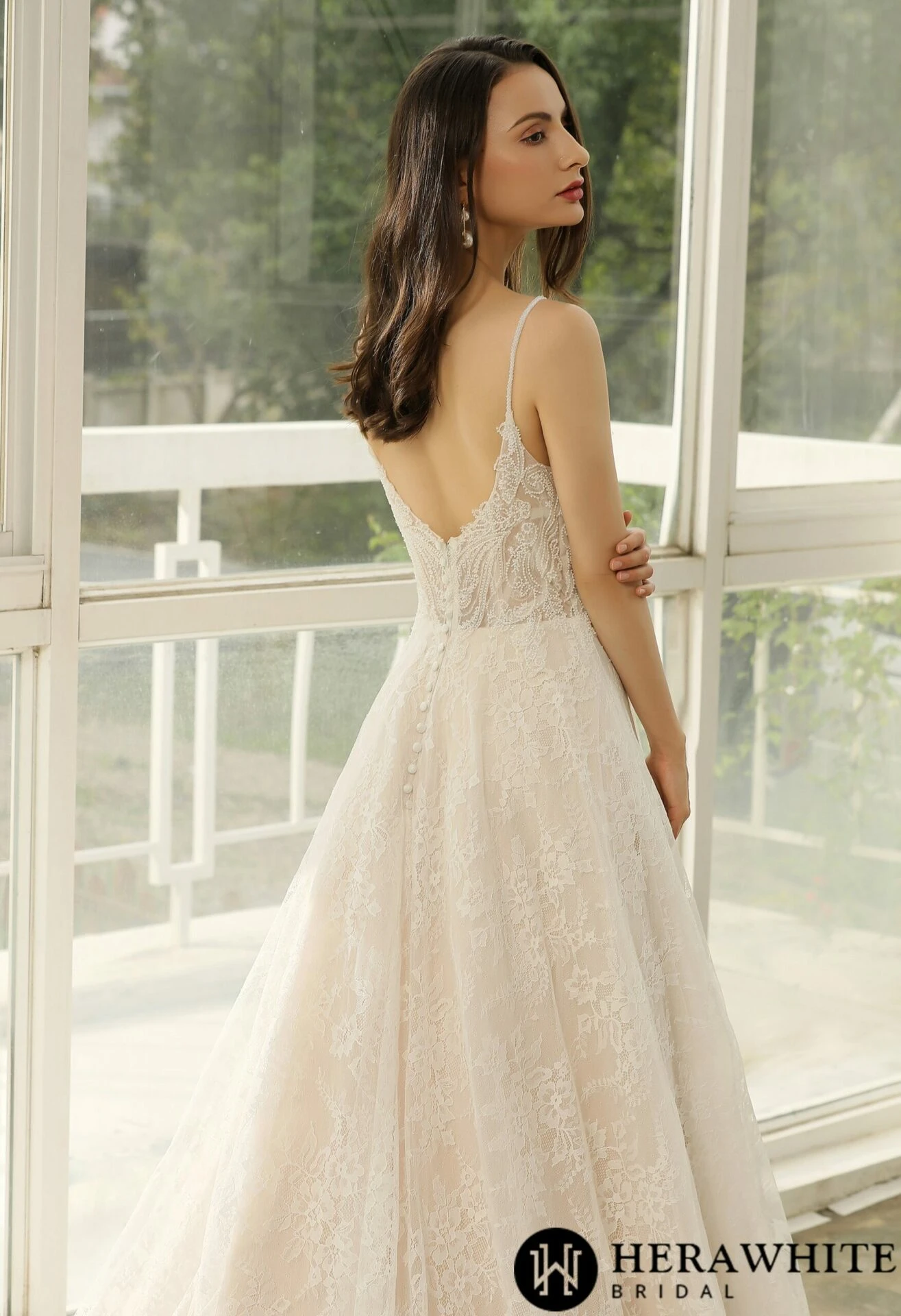 Robe de mariée ligne A en dentelle perlée avec bretelles spaghetti Robe De Mariée Ligne A En Dentelle Perlée Avec Bretelles Spaghetti -Soiree Blanche Boutique 2ccc005446 scaled 1