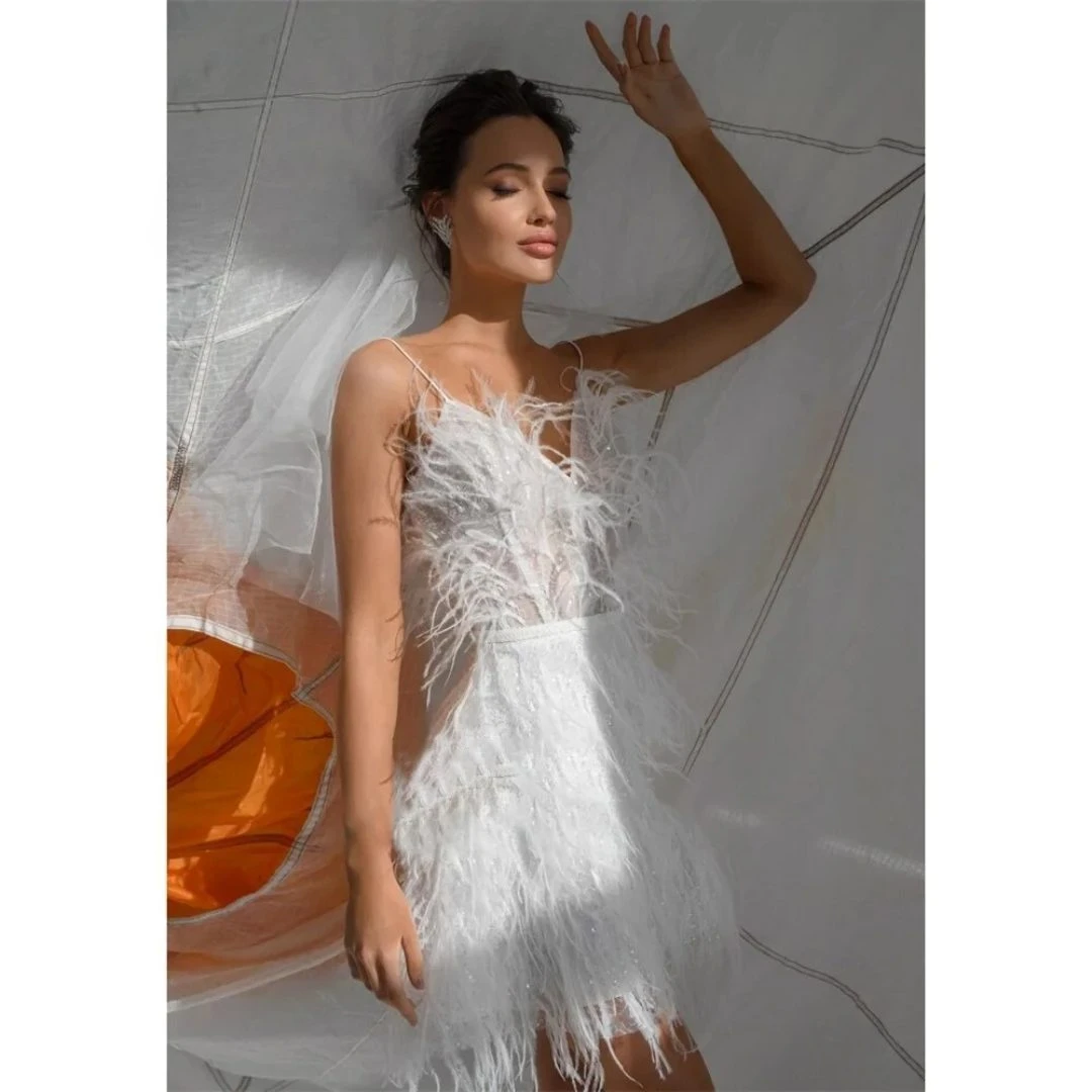 Robe De Mariée Courte A Plume Robe De Mariée Courte A Plume -Soiree Blanche Boutique Design sans titre 59