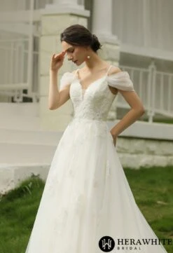 Robe De Mariée Romantique En Dentelle Pailletée à Manches Courtes -Soiree Blanche Boutique b3c22cc5aa scaled 1